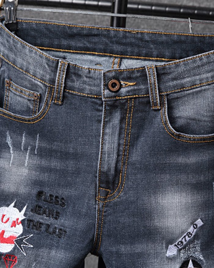 EMMIOL Vaqueros rasgados con bordado de letras para hombre