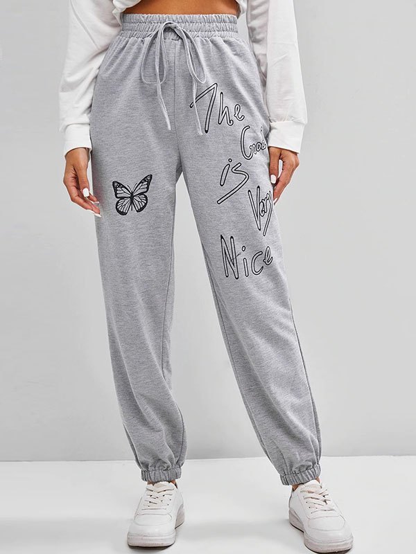 EMMIOL Pantalones joggers con estampado de mariposas y eslogan