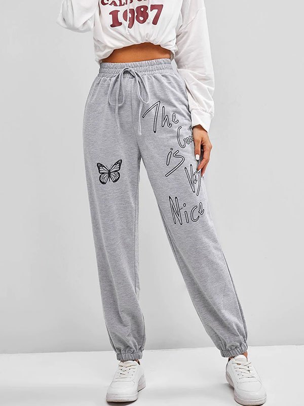 EMMIOL Pantalones joggers con estampado de mariposas y eslogan