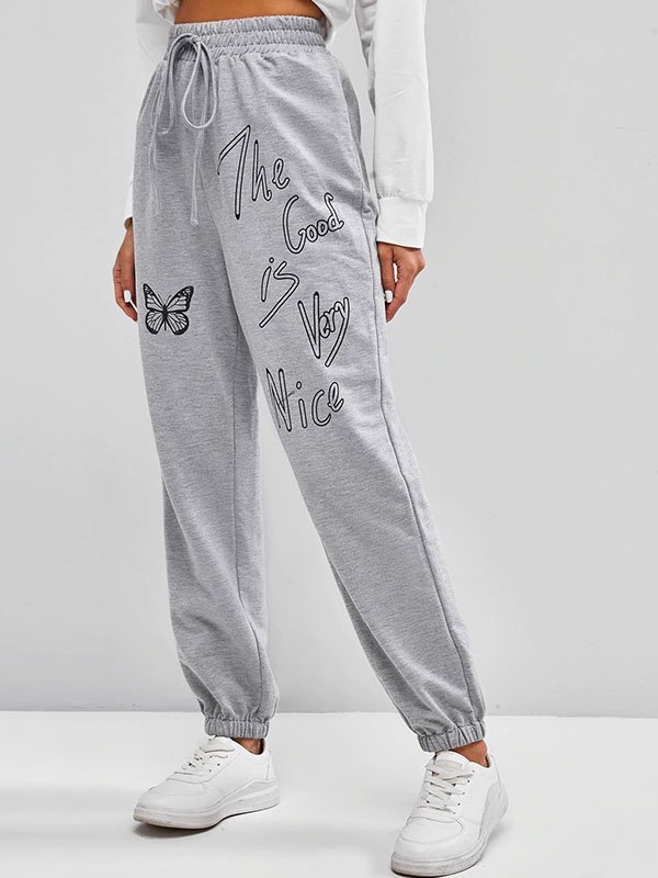 EMMIOL Pantalones joggers con estampado de mariposas y eslogan