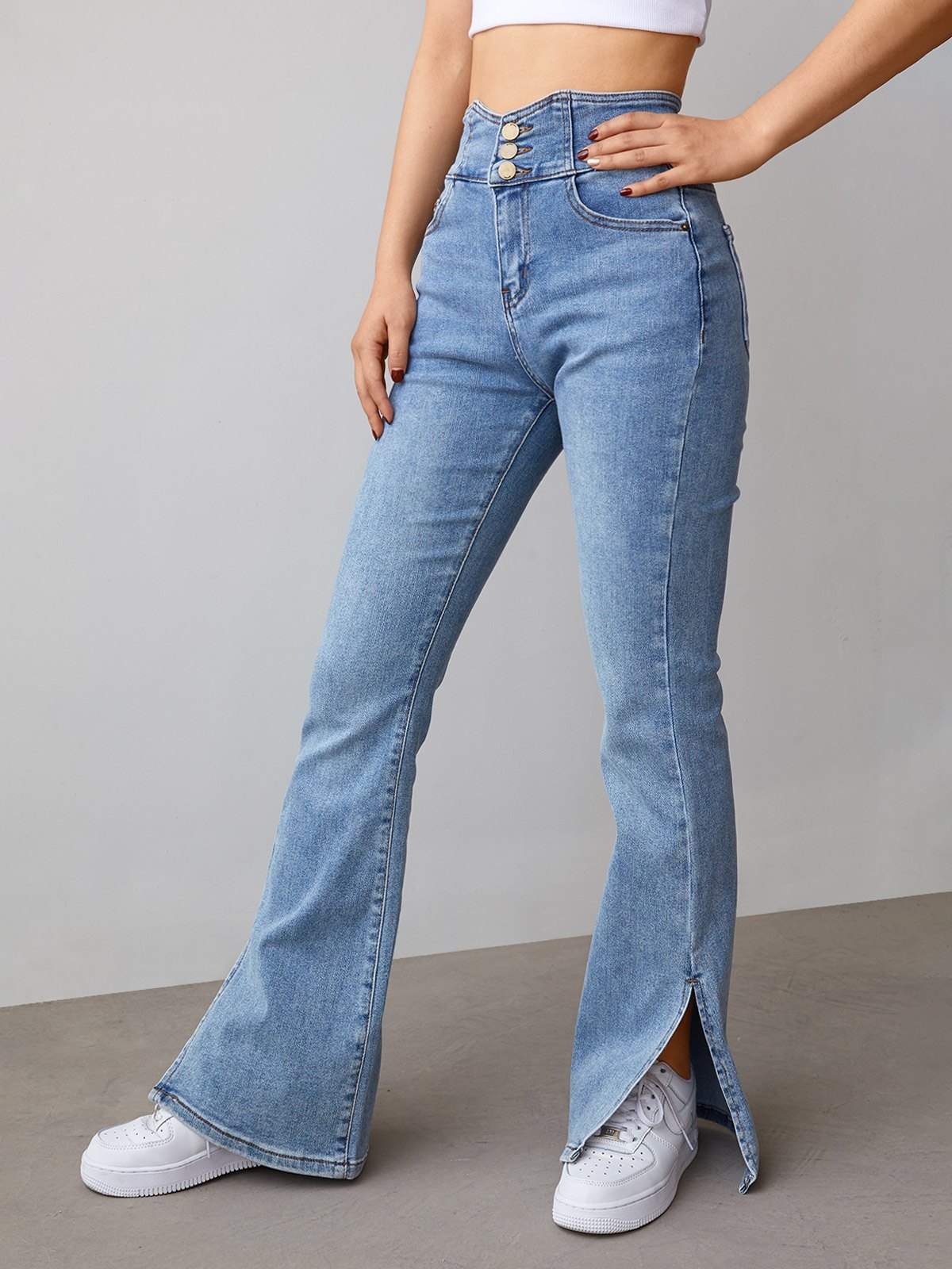 EMMIOL Jeans acampanados con abertura y botones