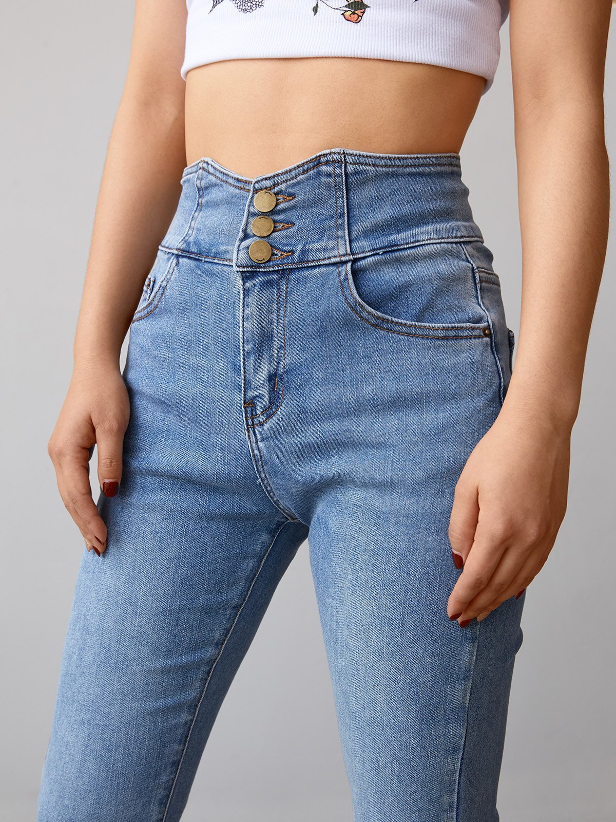 EMMIOL Jeans acampanados con abertura y botones