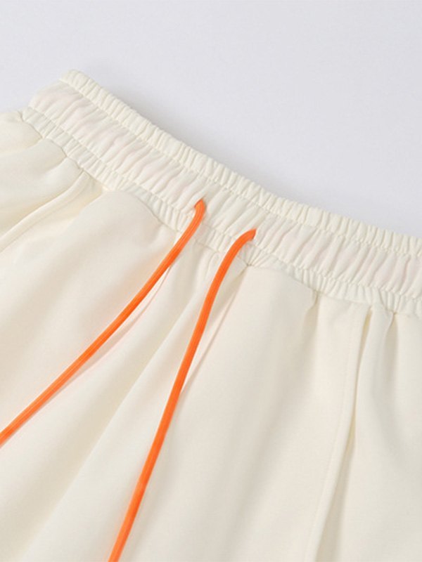 EMMIOL Pantalones jogger con bordado de letras