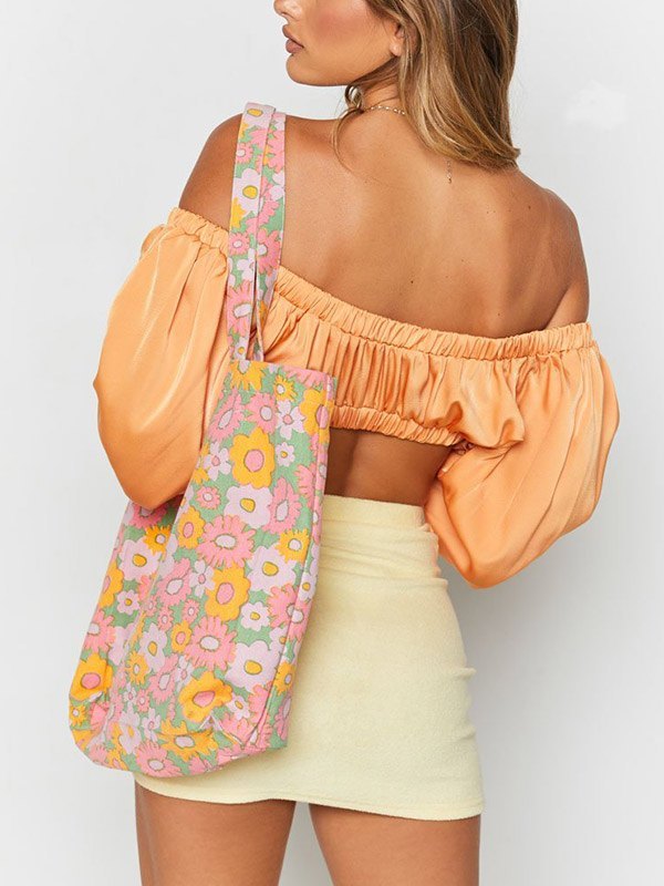 EMMIOL Top corto con mangas abullonadas y anudado al frente