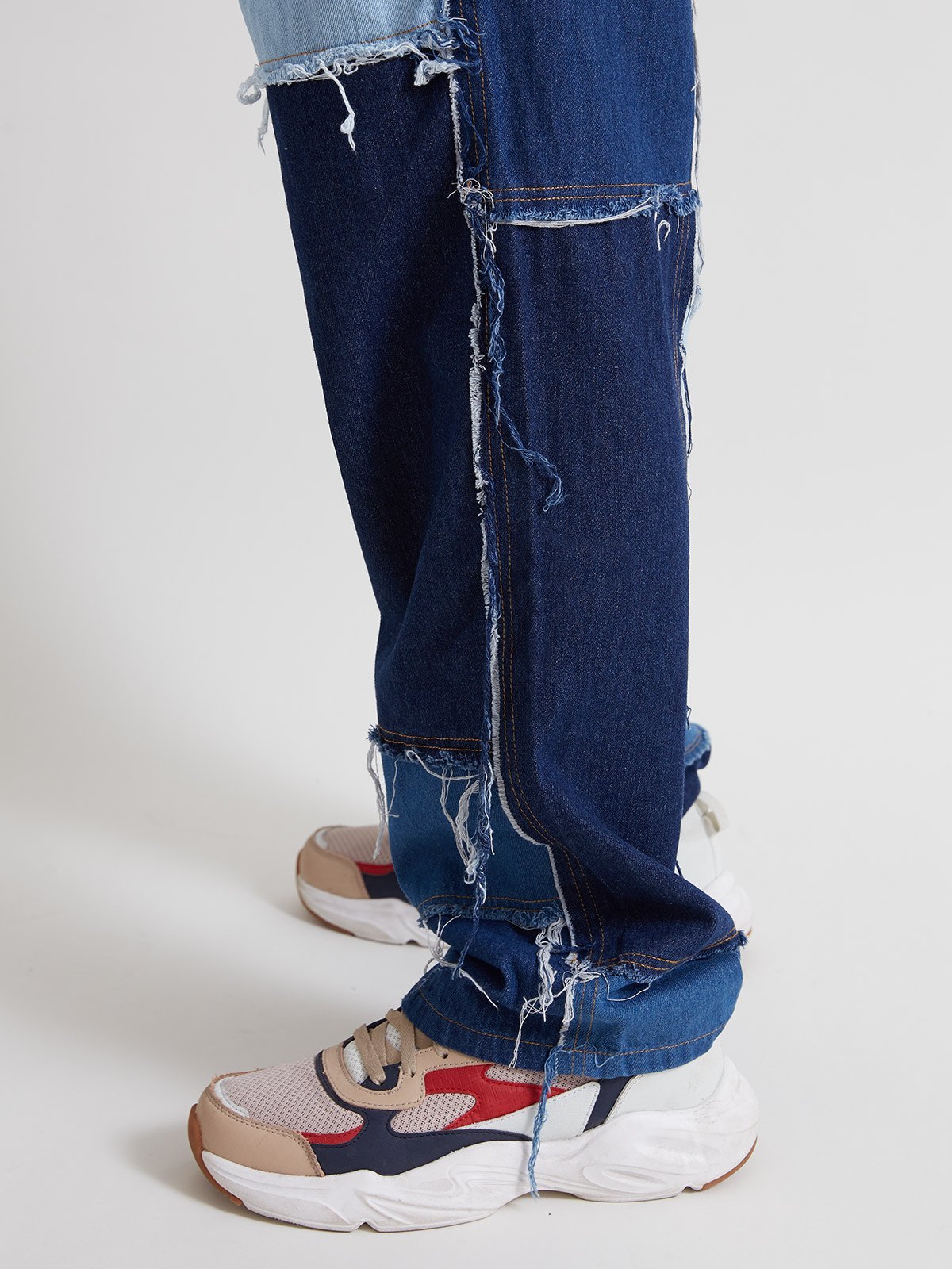 EMMIOL Jeans de skate deshilachados con patchwork para hombre