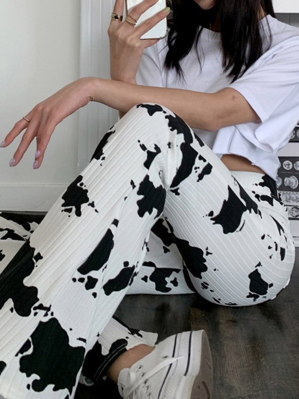 EMMIOL Pantalones acampanados de punto con estampado de vaca