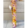 EMMIOL Pantalones acampanados con estampado floral en contraste