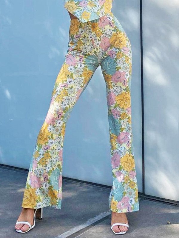 EMMIOL Pantalones acampanados con estampado floral