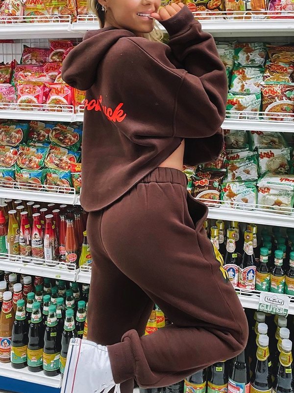 EMMIOL Pantalones joggers con estampado Drip Smile