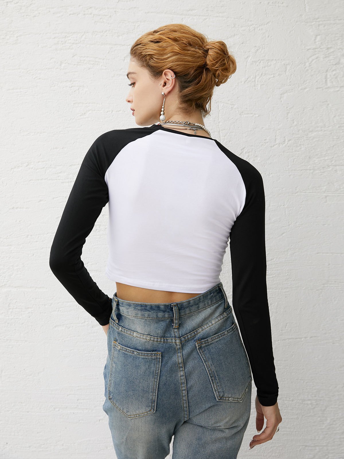 EMMIOL Bedrucktes Raglan-Crop-Top mit langen Ärmeln