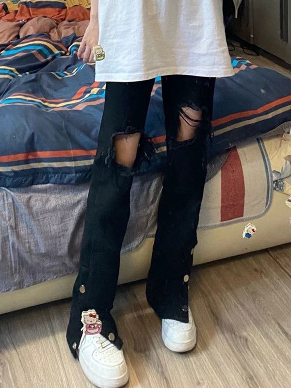 Come indossare e abbinare jeans strappati neri con stivali al ginocchio neri  (3 outfit) | Lookastic