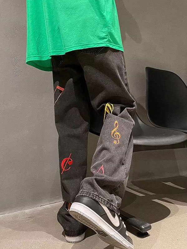 EMMIOL Vaqueros de skate con bordado de notas musicales para hombre