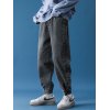 EMMIOL Jeans tipo jogger con botones lavados y recortados para hombre