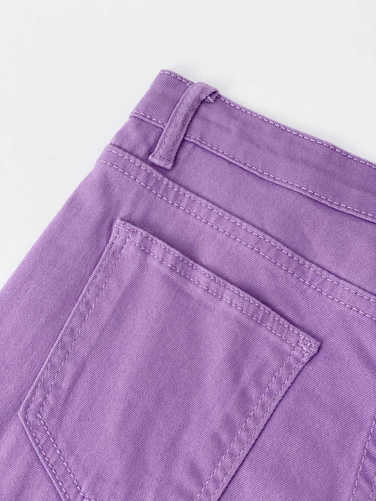 EMMIOL Jeans strappati al ginocchio svasati alla caviglia