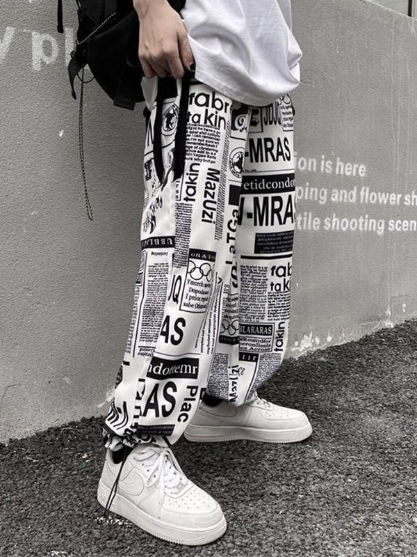 EMMIOL Pantalones tipo jogging con estampado de periódico para hombre