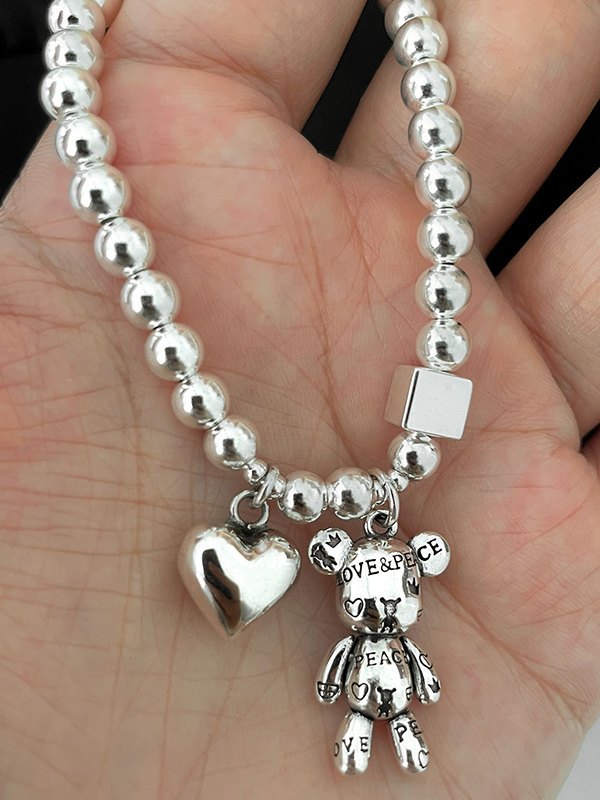 EMMIOL Pulsera de cordón elástico con bola de decoración de oso de corazón