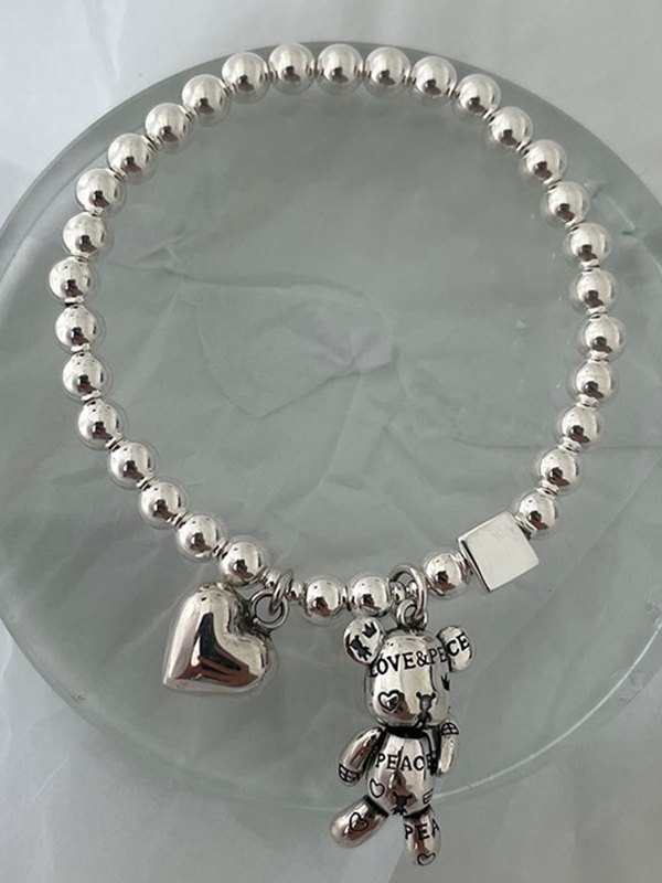 EMMIOL Pulsera de cordón elástico con bola de decoración de oso de corazón