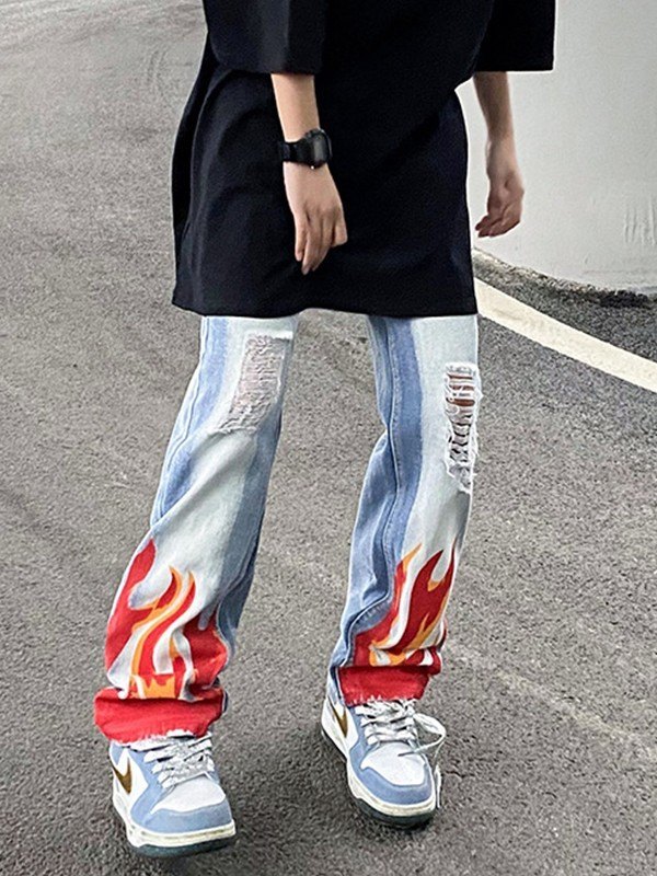 Jeans strappati con stampa fiamma sbiancata