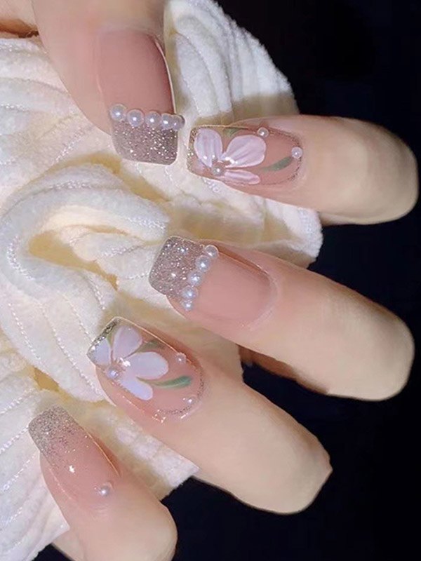 EMMIOL 24 uñas postizas florales con decoración de perlas de imitación con purpurina.