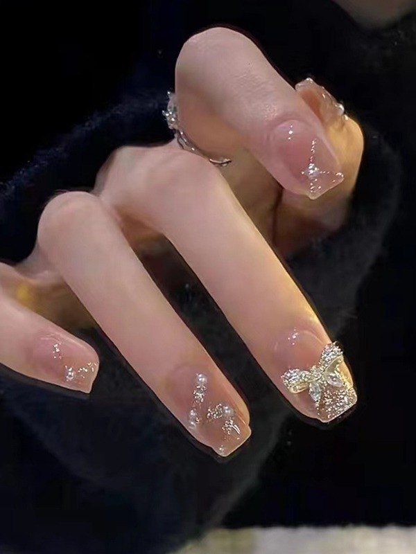 EMMIOL 24 piezas de decoración de perlas de imitación con patrón de lazo prensa en las uñas