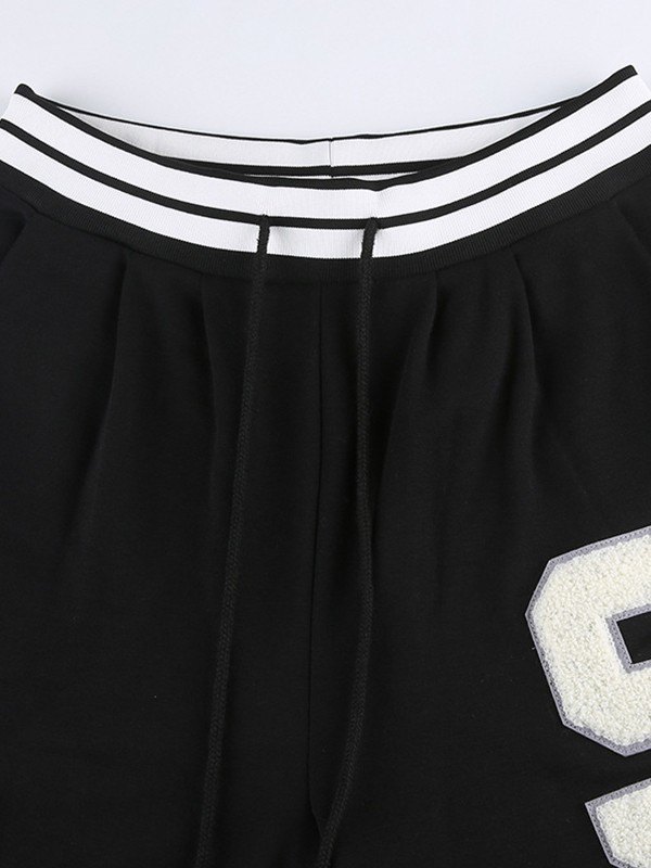 EMMIOL Conjunto de chaqueta y joggers Varsity bordados