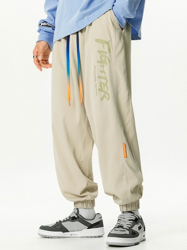 EMMIOL Pantalones jogger casuales sueltos con estampado de letras para hombre