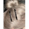 EMMIOL 1 pin de pelo con diseño de letras.