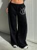 EMMIOL Pantalones anchos con estampados de temática oscura