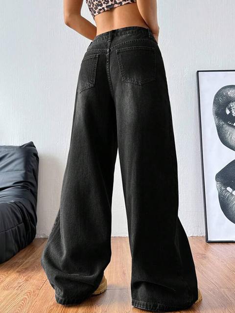 Jeans boyfriend larghi e drappeggiati