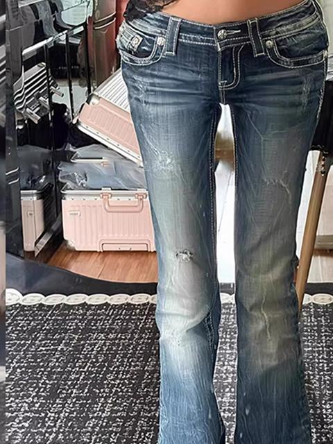 Jeans a zampa con lavaggio consumato di ispirazione vintage