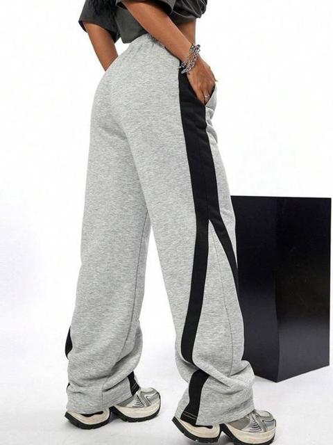 Pantalones deportivos a rayas europeas y americanas