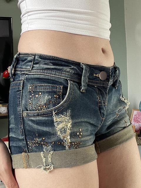 Pantaloncini di jeans vintage rovinati