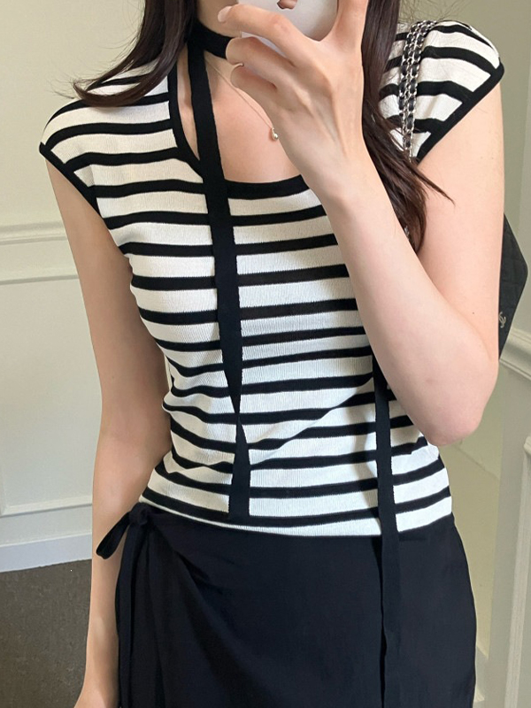 EMMIOL Dotato di una fascia a maniche corte