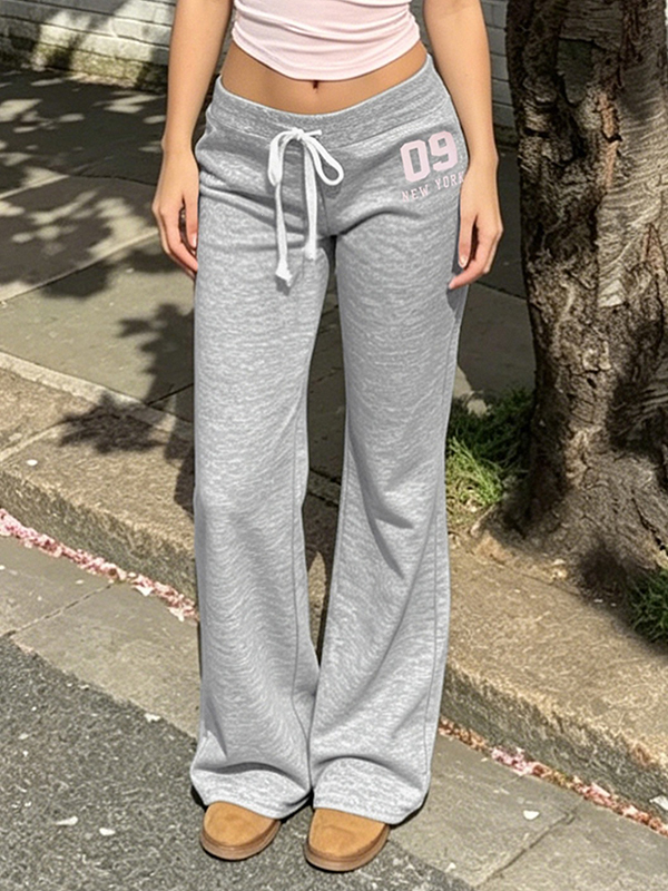 EMMIOL Pantalones sencillos de tiro bajo con cordón ajustable y pernera acampanada.