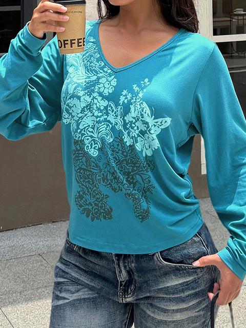 Camiseta azul estampada con cuello en V y manga larga